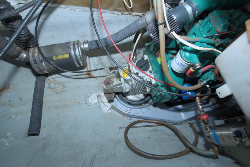 Scout Yacht Photos Pics Engine compartment of a 1996 Manta 40 sailboat, showing mechanical components and hoses.
