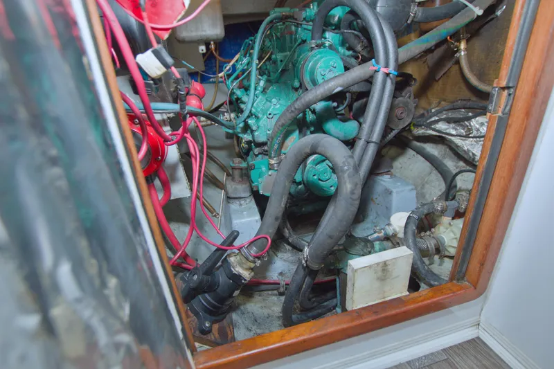 Scout Yacht Photos Pics Engine compartment of a 1996 Manta 40 boat with visible wiring and hoses.