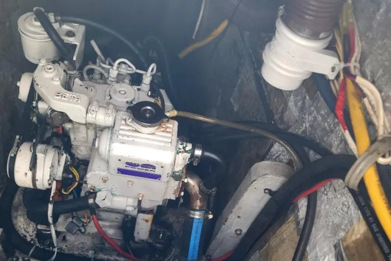 Scout Yacht Photos Pics Engine compartment of a 1996 Manta 40 sailboat with visible wiring and components.