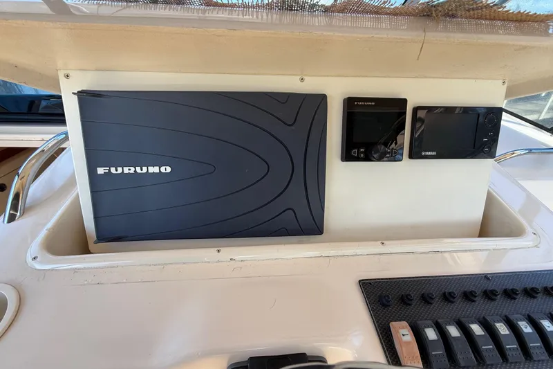  Yacht Photos Pics 2005 Grady-White Express 330 dashboard with Furuno and Yamaha marine electronics.