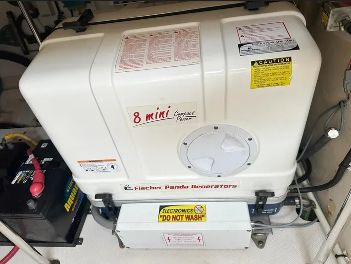  Yacht Photos Pics Fischer Panda generator in 2013 Pursuit 365i Sport Coupe engine room.