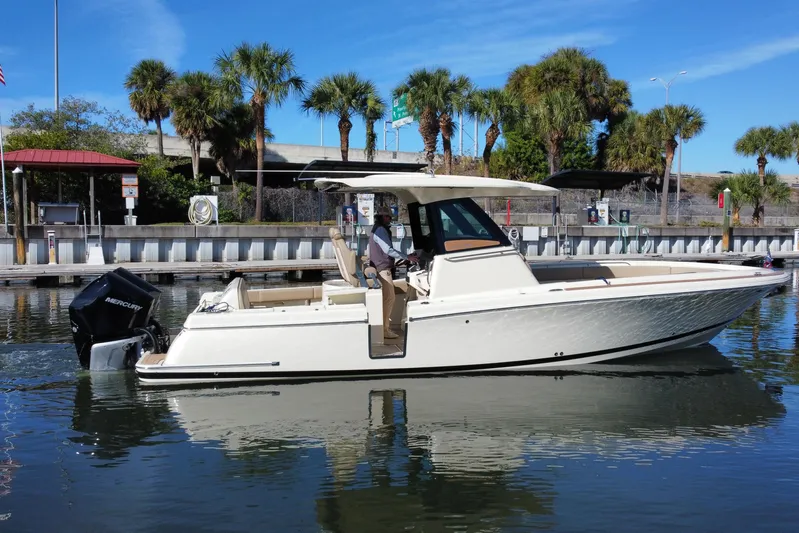  Yacht Photos Pics 2022 Chris-Craft Catalina 30 boat docked, featuring sleek design and powerful Mercury engine.