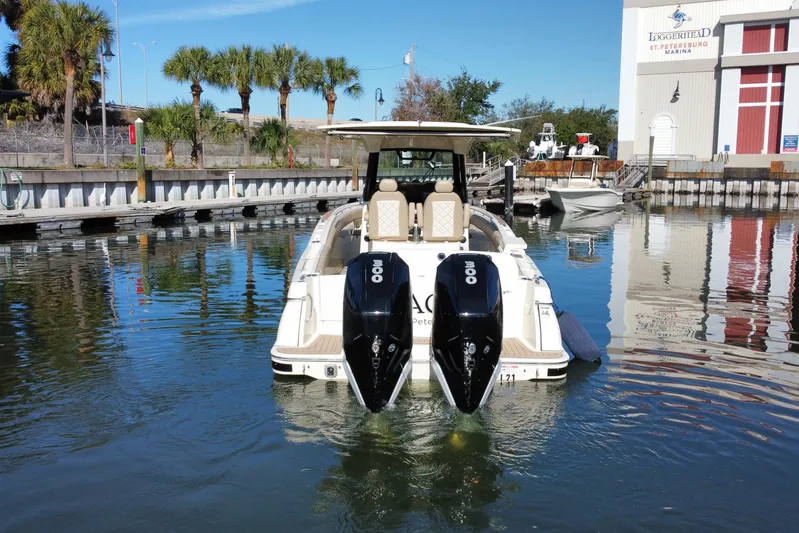  Yacht Photos Pics 2022 Chris-Craft Catalina 30 boat docked at marina with twin outboard engines.