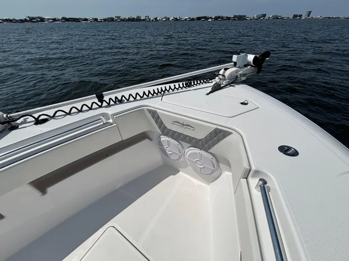  Yacht Photos Pics 2022 Invincible 36 Open Fisherman boat on water, featuring deck and speakers.