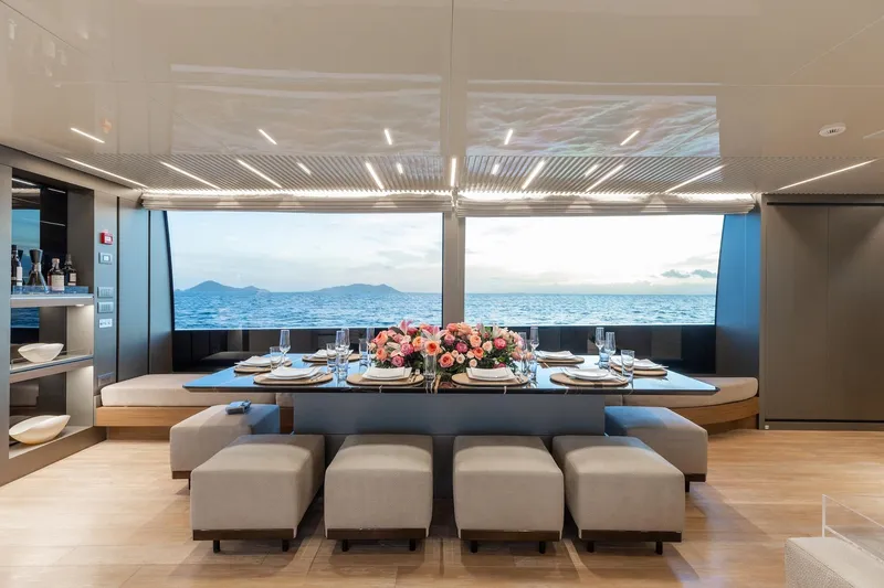 Ambar Yacht Photos Pics Luxurious dining area on 2020 Sanlorenzo SLA120A yacht with ocean view.
