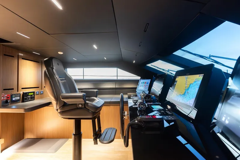 Ambar Yacht Photos Pics Modern helm station of 2020 Sanlorenzo SLA120A yacht with advanced navigation systems.