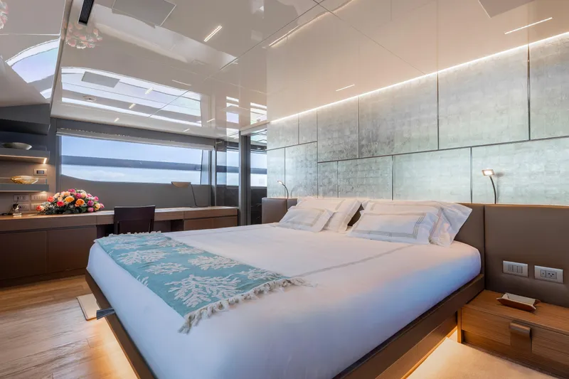 Ambar Yacht Photos Pics Luxurious bedroom interior on 2022 Sanlorenzo SL120A yacht with modern design and elegant decor.
