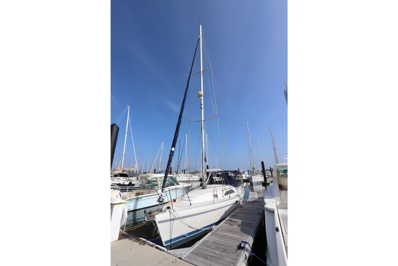  Yacht Photos Pics Sailboat Catalina 355, 2011 model, docked at marina under clear blue sky.