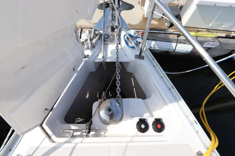  Yacht Photos Pics Anchor locker of a 2011 Catalina 355 sailboat with visible chain and winch.