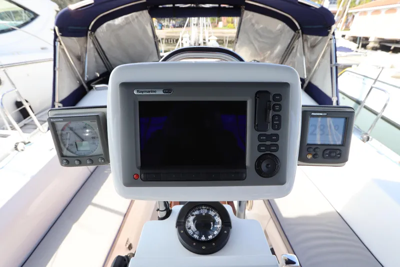  Yacht Photos Pics Cockpit of 2011 Catalina 355 sailboat with Raymarine navigation equipment and compass.