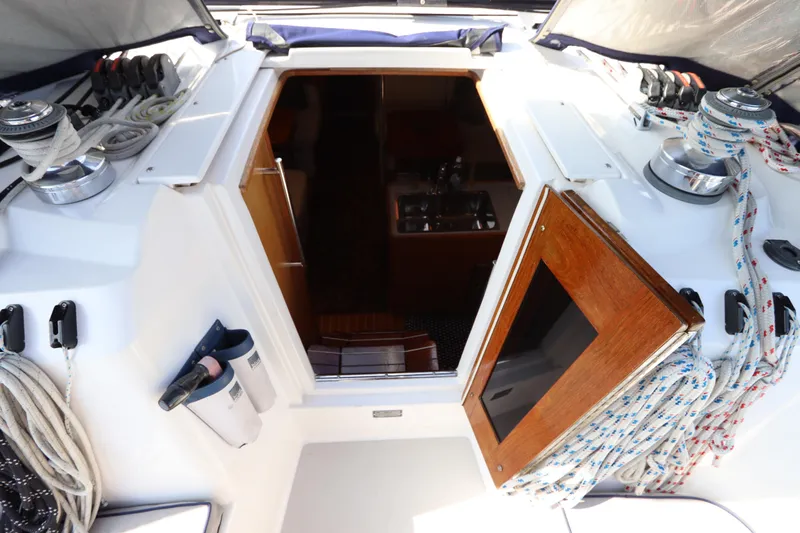  Yacht Photos Pics Cockpit view of a 2011 Catalina 355 sailboat, featuring ropes and winches.