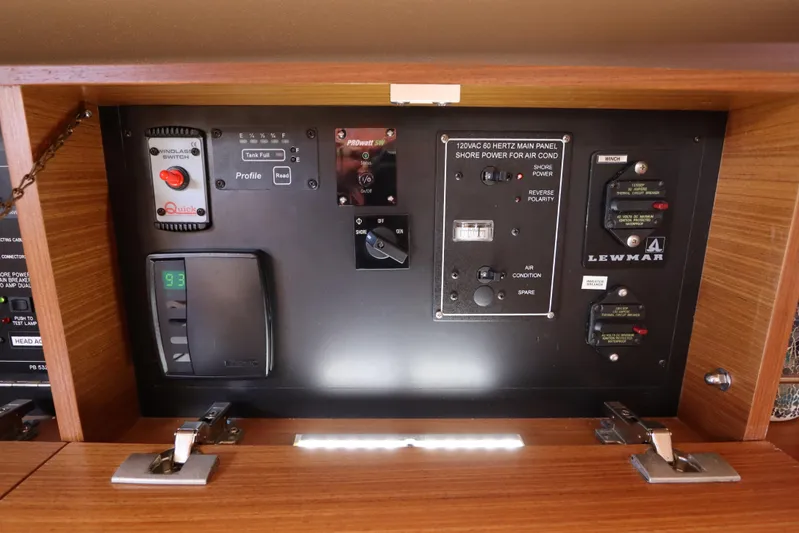  Yacht Photos Pics Control panel of a 2011 Catalina 355 sailboat with various switches and indicators.