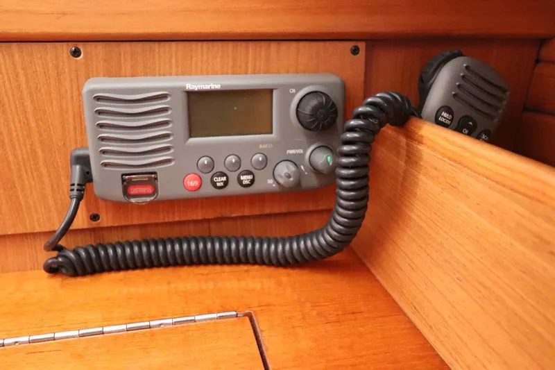  Yacht Photos Pics Raymarine marine radio on 2011 Catalina 355 sailboat, mounted on wooden panel.