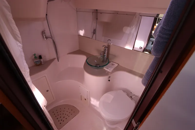  Yacht Photos Pics Bathroom interior of 2011 Catalina 355 yacht with modern fixtures and compact design.