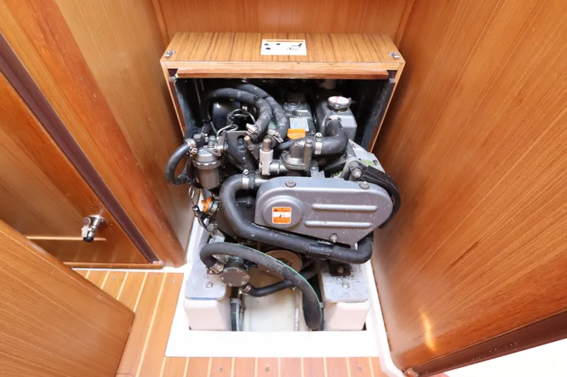  Yacht Photos Pics Engine compartment of a 2011 Catalina 355 sailboat, showcasing mechanical components.