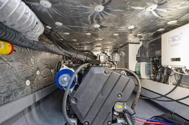 Navitas Yacht Photos Pics Engine room of 2019 Itacatamarans 14.99, showcasing mechanical components and wiring.