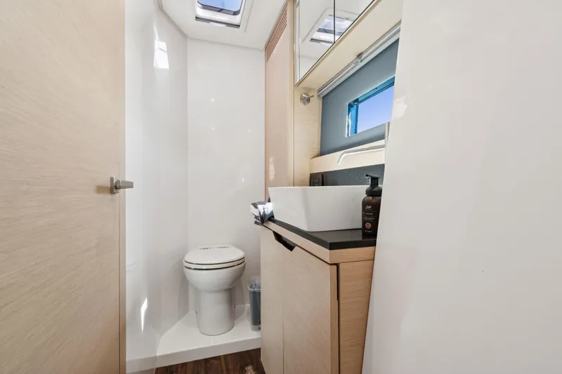 Navitas Yacht Photos Pics Modern bathroom in 2019 Itacatamarans 14.99 yacht with sleek fixtures and natural lighting.