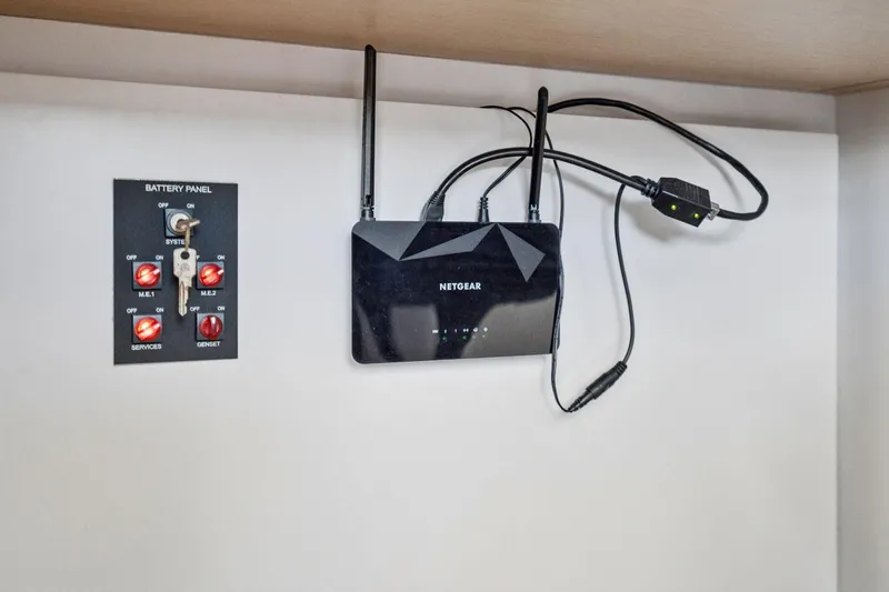 Navitas Yacht Photos Pics Battery panel and Netgear router inside 2019 Itacatamarans 14.99 yacht.