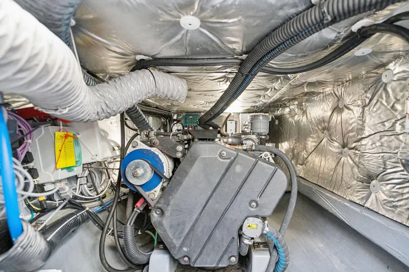 Navitas Yacht Photos Pics Engine room of 2019 Itacatamarans 14.99, showcasing mechanical components and wiring.