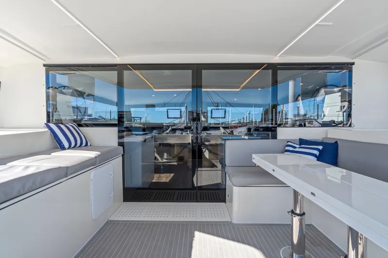 Navitas Yacht Photos Pics Luxurious 2019 Itacatamarans 14.99 interior with modern seating and sleek design.