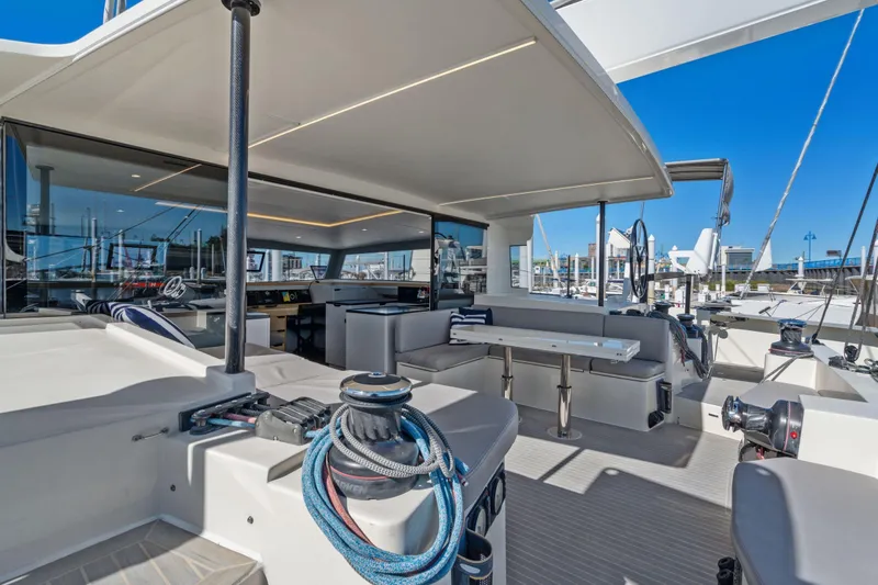 Navitas Yacht Photos Pics Luxurious 2019 Itacatamarans 14.99 yacht interior with modern seating and navigation equipment.