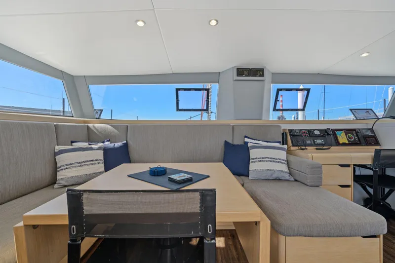Navitas Yacht Photos Pics Interior of 2019 Itacatamarans 14.99, featuring modern seating and navigation area.