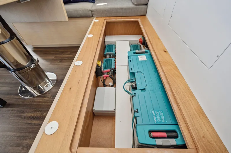 Navitas Yacht Photos Pics Under-seat storage in 2019 Itacatamarans 14.99, featuring battery and electrical components.