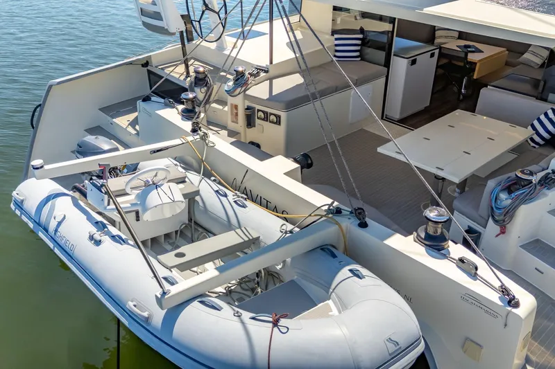 Navitas Yacht Photos Pics 2019 Itacatamarans 14.99 catamaran with inflatable dinghy, spacious deck, and modern interior.