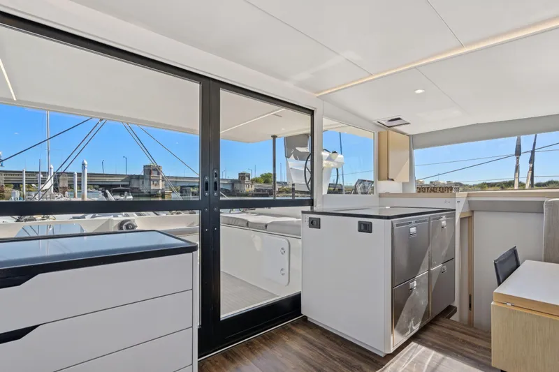 Navitas Yacht Photos Pics Modern interior of 2019 Itacatamarans 14.99 yacht with sleek design and ample natural light.