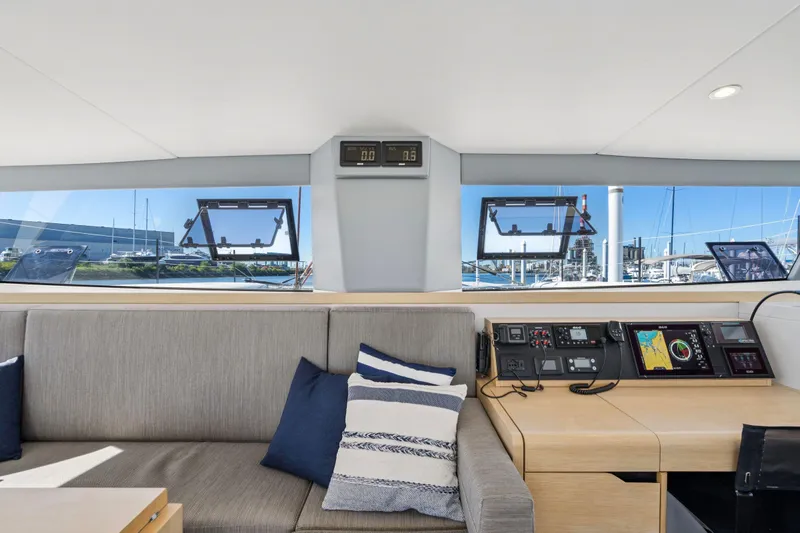 Navitas Yacht Photos Pics Interior of 2019 Itacatamarans 14.99, featuring modern navigation equipment and comfortable seating.