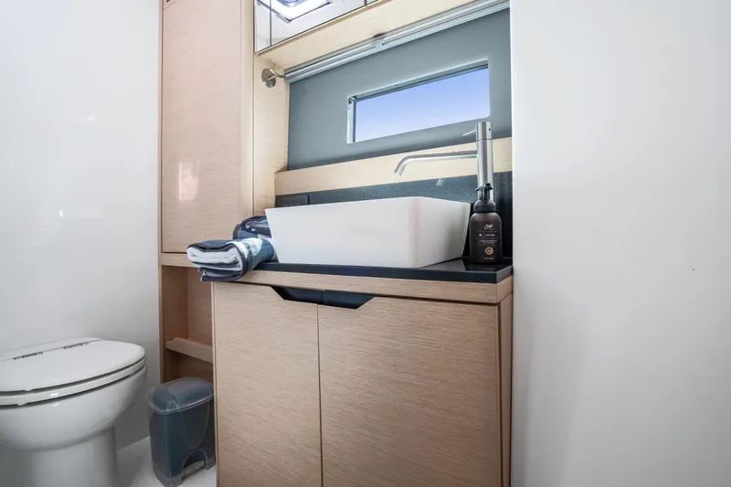 Navitas Yacht Photos Pics Modern bathroom in 2019 Itacatamarans 14.99 yacht with sleek sink and toilet.