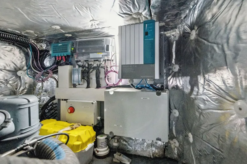 Navitas Yacht Photos Pics Electrical system inside 2019 Itacatamarans 14.99, featuring wiring and control panels.