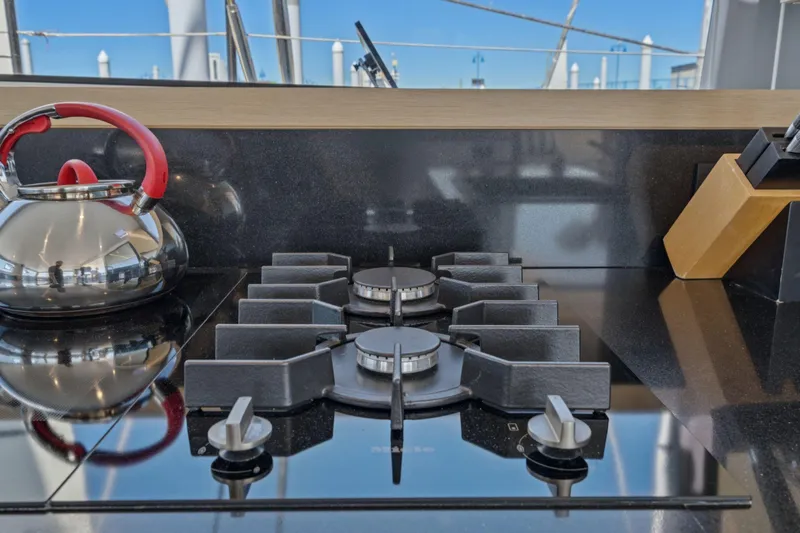 Navitas Yacht Photos Pics Modern kitchen stove with kettle on Itacatamarans 14.99, 2019 model.