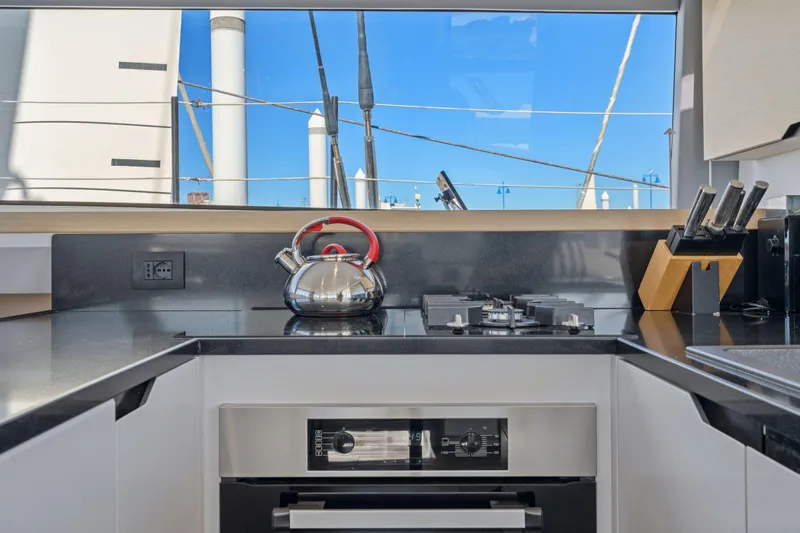 Navitas Yacht Photos Pics Modern kitchen in 2019 Itacatamarans 14.99 yacht with sleek appliances and ocean view.