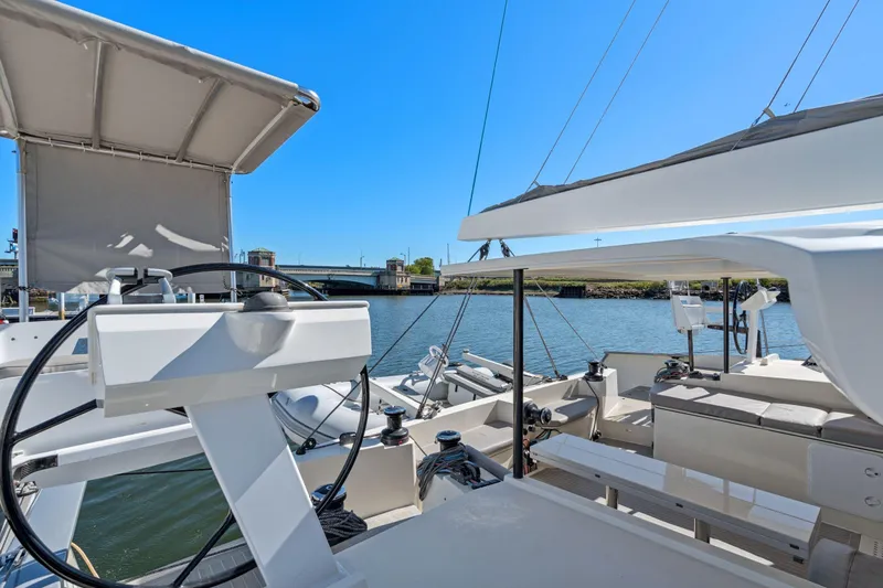 Navitas Yacht Photos Pics 2019 Itacatamarans 14.99 catamaran with dual helm stations on a sunny day.