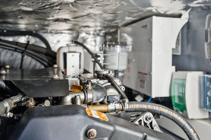 Navitas Yacht Photos Pics Engine room of 2019 Itacatamarans 14.99, showcasing mechanical components and wiring.