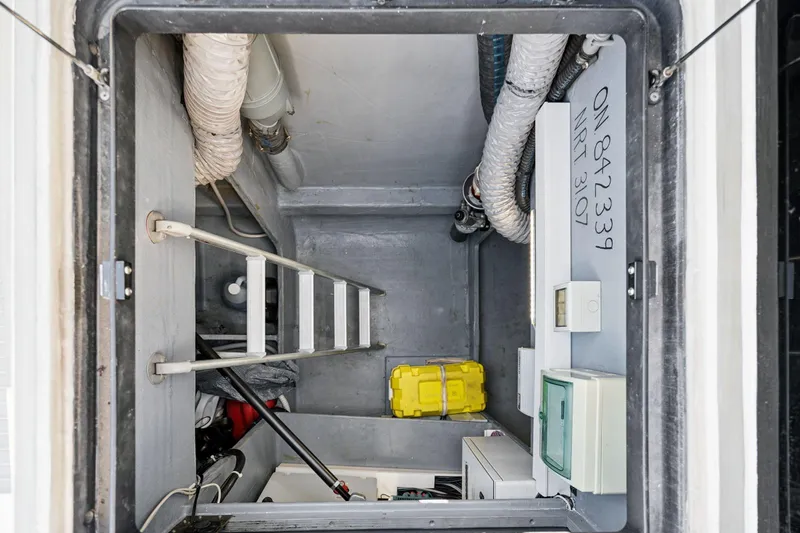 Navitas Yacht Photos Pics Engine room of 2019 Itacatamarans 14.99 with ladder and equipment.