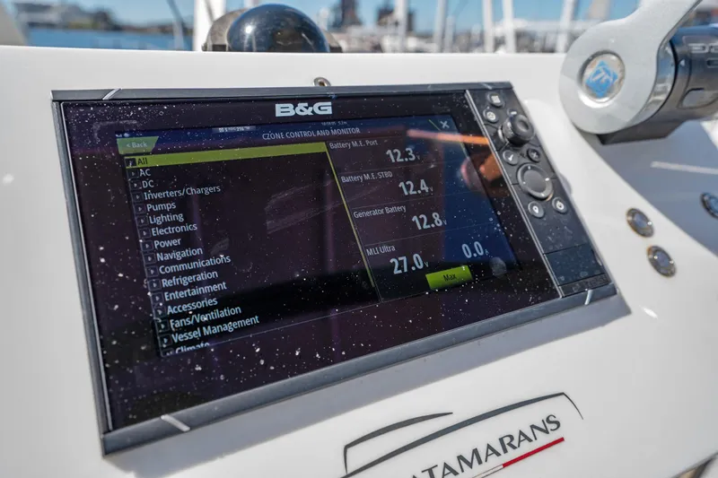 Navitas Yacht Photos Pics Control panel on 2019 Itacatamarans 14.99, displaying battery and system information.
