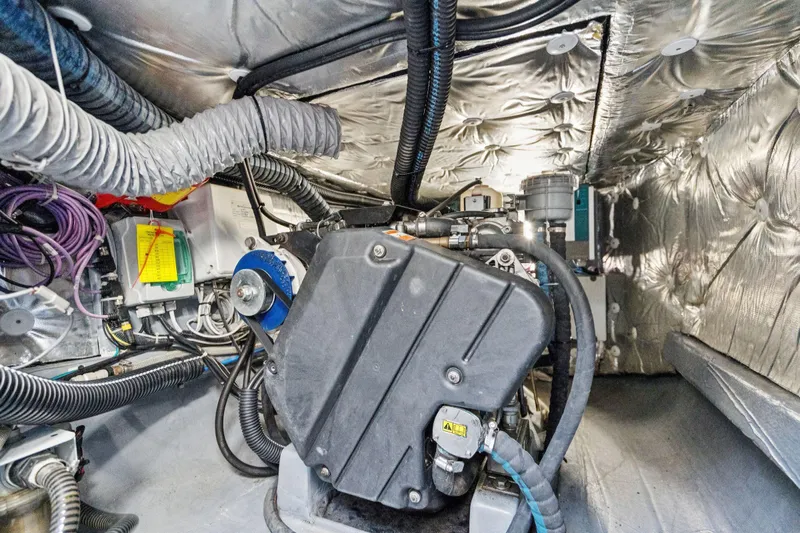 Navitas Yacht Photos Pics Engine room of 2019 Itacatamarans 14.99, featuring complex wiring and insulation.