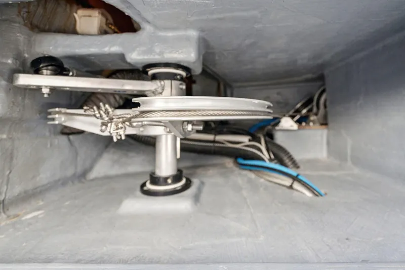 Navitas Yacht Photos Pics 2019 Itacatamarans 14.99 steering mechanism with cables and pulleys in a compartment.