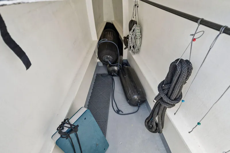 Navitas Yacht Photos Pics Storage area on a 2019 Itacatamarans 14.99, featuring ropes and fenders.
