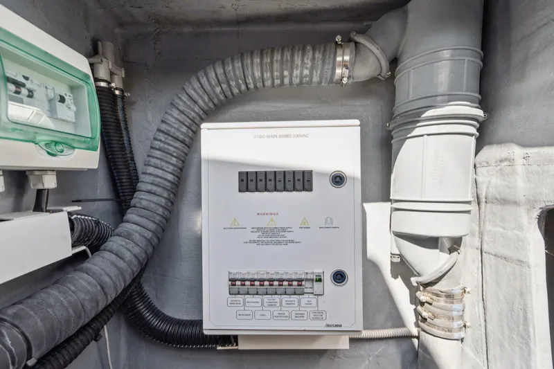 Navitas Yacht Photos Pics Electrical panel in 2019 Itacatamarans 14.99 yacht, featuring circuit breakers and wiring.