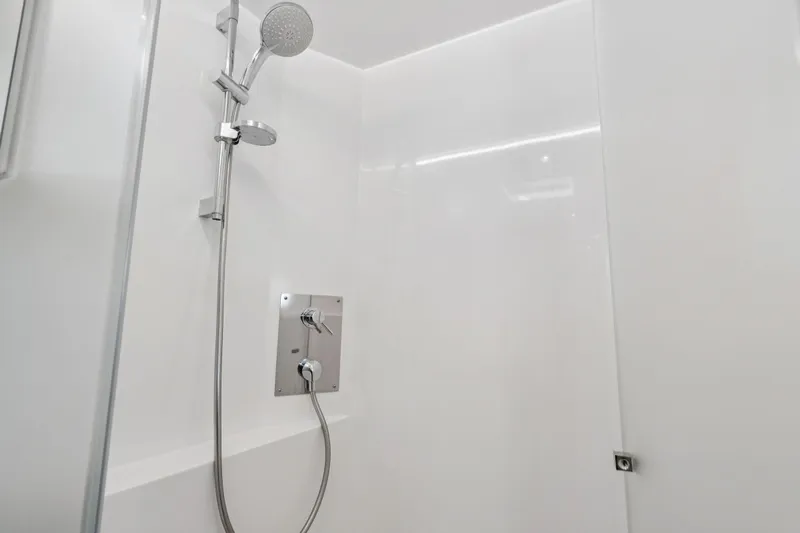 Navitas Yacht Photos Pics Modern shower in 2019 Itacatamarans 14.99 yacht, featuring sleek chrome fixtures.