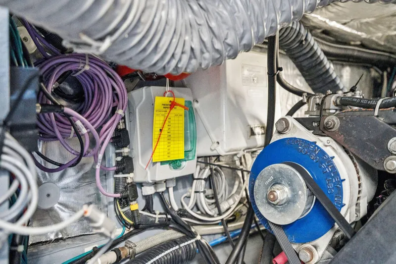 Navitas Yacht Photos Pics Engine room of 2019 Itacatamarans 14.99 with cables and mechanical components.