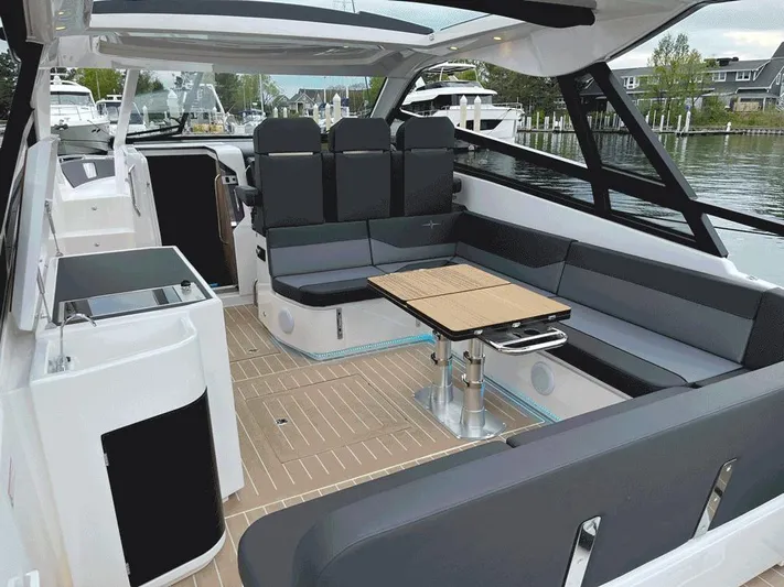 Inventory Clearance Yacht Photos Pics 2023 Bavaria Vida 33 yacht interior with sleek seating and modern design.