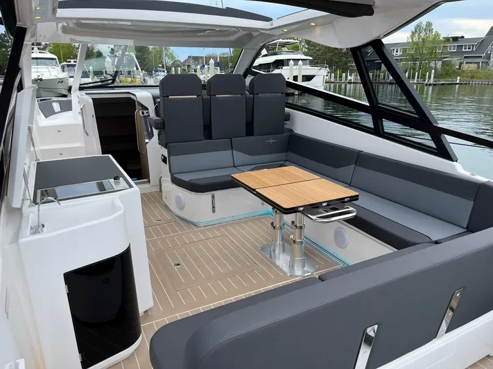 Inventory Clearance Yacht Photos Pics 2023 Bavaria Vida 33 yacht interior with sleek seating and modern design.