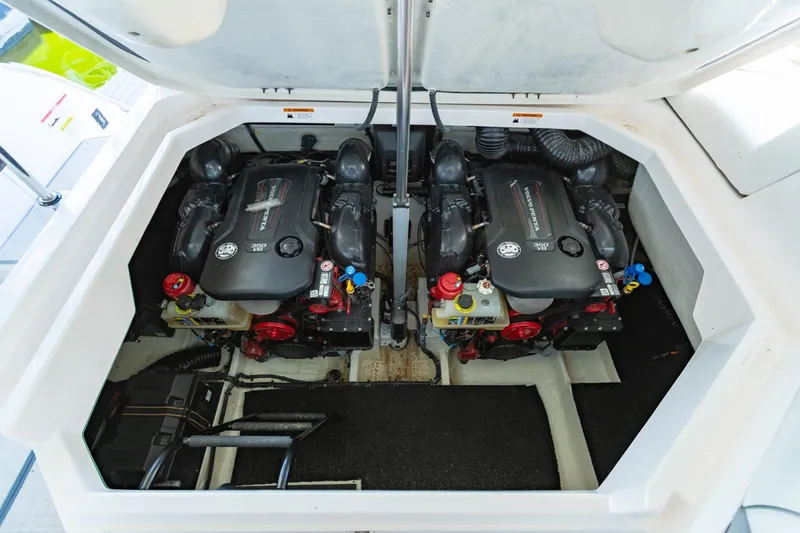 The Big Dill Yacht Photos Pics 2023 Regal LS36 boat engine compartment with dual engines, showcasing modern design and technology.