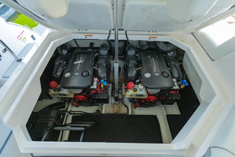 The Big Dill Yacht Photos Pics 2023 Regal LS36 boat engine compartment with dual powerful engines.