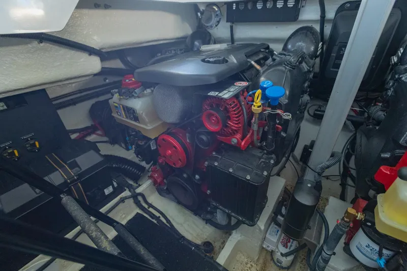 The Big Dill Yacht Photos Pics Engine compartment of 2023 Regal LS36 boat, showcasing detailed mechanical components.