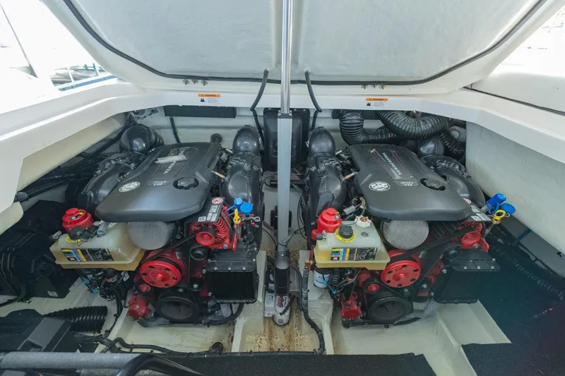The Big Dill Yacht Photos Pics Engine compartment of 2023 Regal LS36 boat, featuring dual powerful engines.